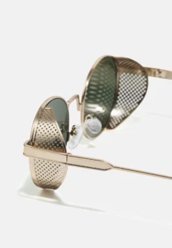 URBAN CLASSICS Sunglasses Sicilia Unisex - Zonnebril - Anticgold/Brown -Modieuze Mannen 2e289357a5d74af09626d41e957556ef scaled