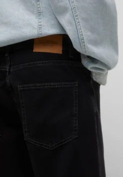 PULL & BEAR Wide - Relaxed Fit Jeans - Black 11 PULL & BEAR Wide - Relaxed Fit Jeans - Black -Modieuze Mannen 389c5028af664dc68f86009e85eebdb0 scaled
